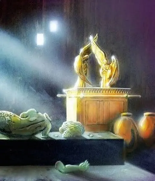 Painting of the golden ark of the covenant glowing in a beam of light inside a dark temple, with the toppled statue of Dagon, its head and a hand broken off, lying in front of it